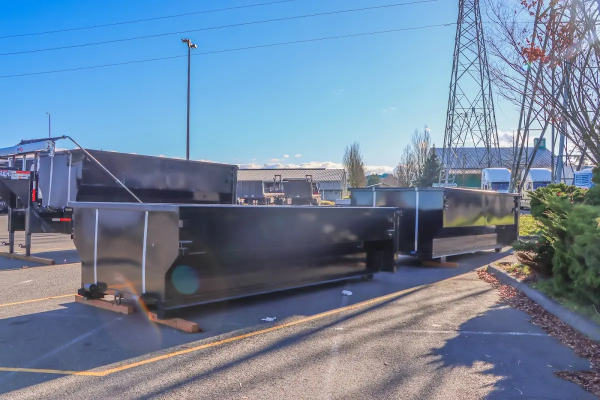 Roll-off dumpster ready for waste disposal at job site for 15 Yard Dumpster Rental in Cumberland